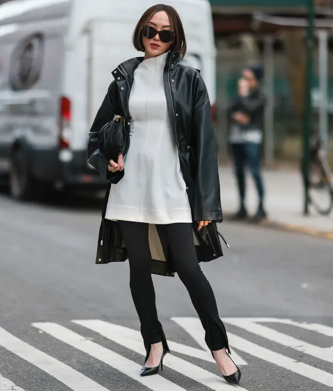 woman wearing a minidress over pants' fetchpriority='auto' title='31 Outfit Ideas for a Sparkly Stylish and Rather Festive December