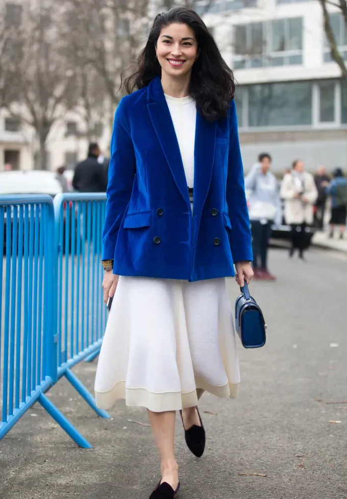 woman wearing a velvet blazer and tulle skirt' fetchpriority='auto' title='31 Outfit Ideas for a Sparkly Stylish and Rather Festive December