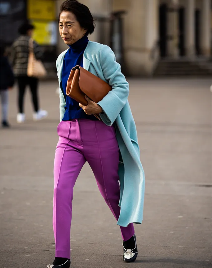 woman wearing lots of bright colors' fetchpriority='auto' title='31 Outfit Ideas for a Sparkly Stylish and Rather Festive December