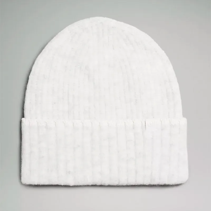 lululemon beanie' title='Wondering How to Style Flannel? Here Are 17 Outfit Ideas to Try According to a Fashion Editor