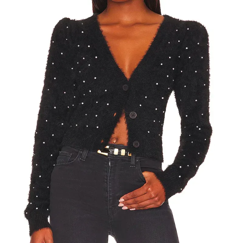 majorelle embellished cardigan sweater' title='13 On-Trend Ways to Wear Leather Pants in 2024 (Plus One Look to Definitely Avoid)