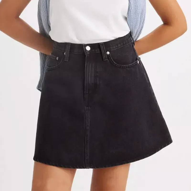 levis denim miniskirt' title='22 Easy Black Skirt Outfit Ideas for When You Have Five Minutes to Get Dressed