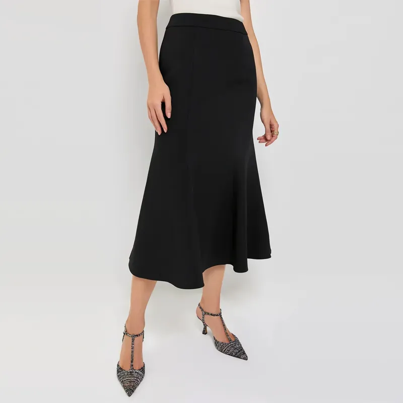 tuckernuck midi skirt' title='22 Easy Black Skirt Outfit Ideas for When You Have Five Minutes to Get Dressed