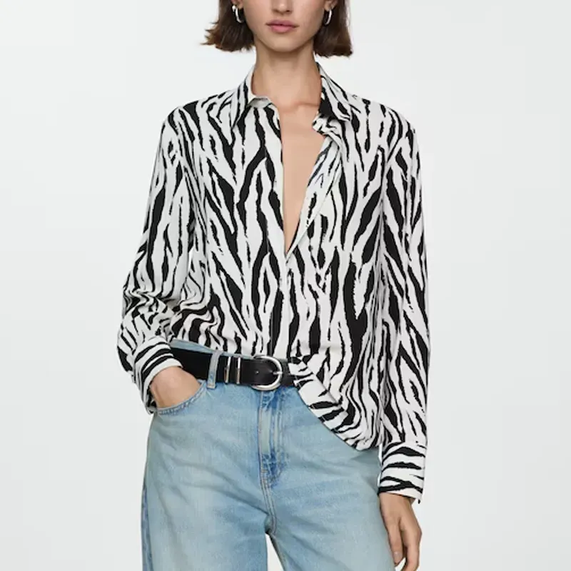 mango zebra top' title='22 Easy Black Skirt Outfit Ideas for When You Have Five Minutes to Get Dressed