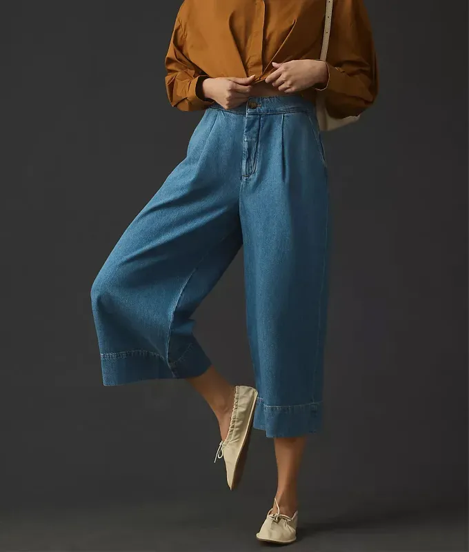 culotte pants: pilcro pleated culottes in denim by anthropologie' title='Culotte Pants Are Everywhere. Here’s How to Style Them (Plus 15 Pairs We’re Coveting)