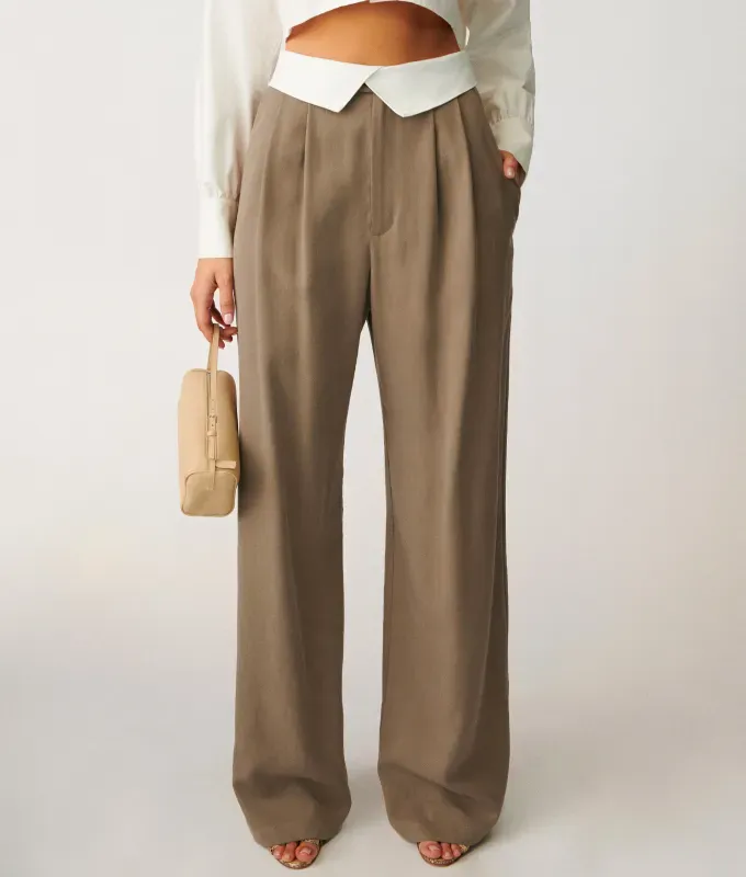 reformation double waistband pants trend' title='Double Waistband Pants Are Trending and Even Anne Hathaway Is a Fan