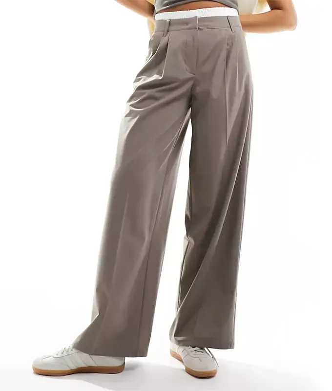 asos bershka double waistband pants trend' title='Double Waistband Pants Are Trending and Even Anne Hathaway Is a Fan