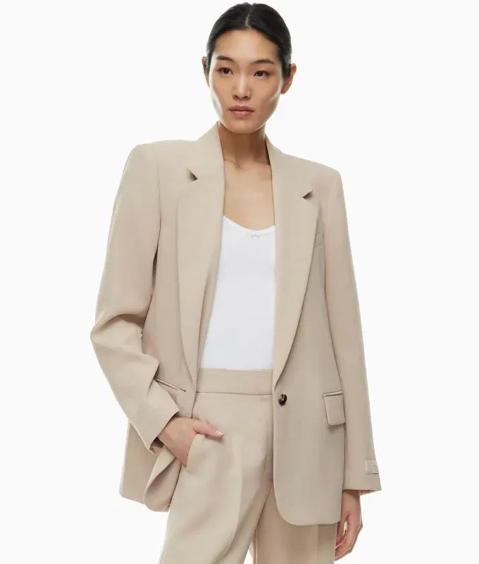 The Aritzia New Generation Blazer.' title='The Demure Trend Will Reign Supreme This Fall and These 10 ’Very Cutesy Very Modest’ Pieces Will Help You Pull It Off