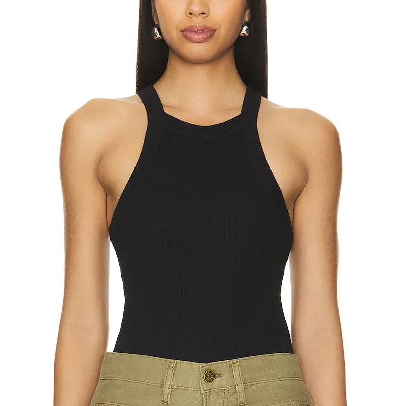 allsaints tank top 90s fashion trend' title='The ‘90s Fashion Revival Is in Full Swing—Here’s How to Wear the Trend This Summer