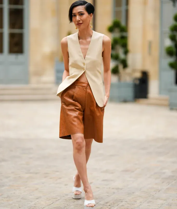 bermuda shorts 90s minimalism fashion trend' fetchpriority='auto' title='The ‘90s Fashion Revival Is in Full Swing—Here’s How to Wear the Trend This Summer