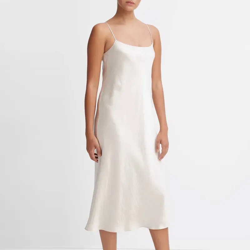 vince slip dress 90s fashion trend' title='The ‘90s Fashion Revival Is in Full Swing—Here’s How to Wear the Trend This Summer