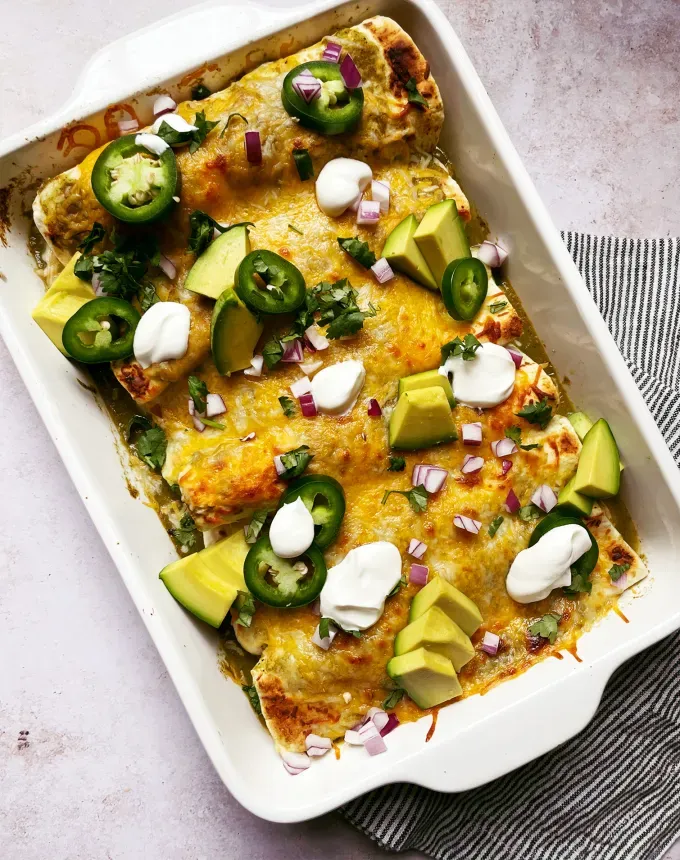 postpartum freezer meals: easy green chicken enchiladas' title='31 Postpartum Freezer Meals Any Parent Will Appreciate