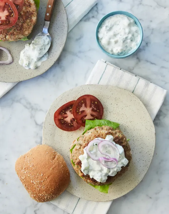 postpartum freezer meals: greek turkey burgers with tzatziki sauce' title='31 Postpartum Freezer Meals Any Parent Will Appreciate