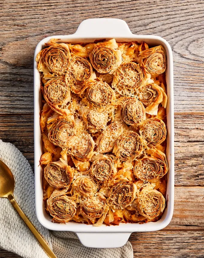 postpartum freezer meals: mac and cheese with crispy phyllo parmesan crust' title='31 Postpartum Freezer Meals Any Parent Will Appreciate