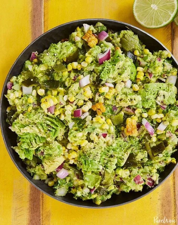 savory appetizers: roasted poblano and corn guacamole' title='51 Savory Appetizers That Are Sure to Get the Party Started from Make-Ahead Gems to Cheesy Delights