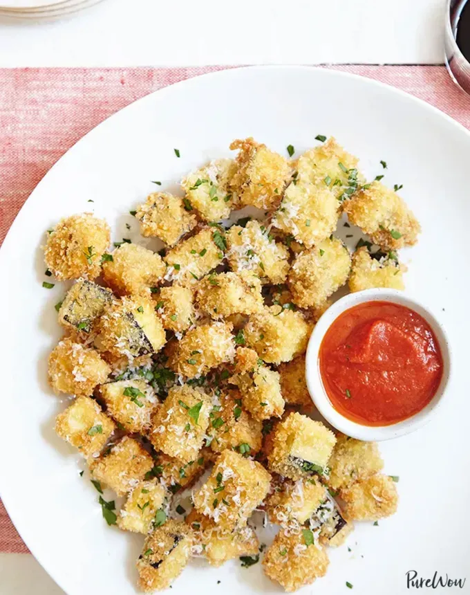 savory appetizers: eggplant parm bites' title='51 Savory Appetizers That Are Sure to Get the Party Started from Make-Ahead Gems to Cheesy Delights