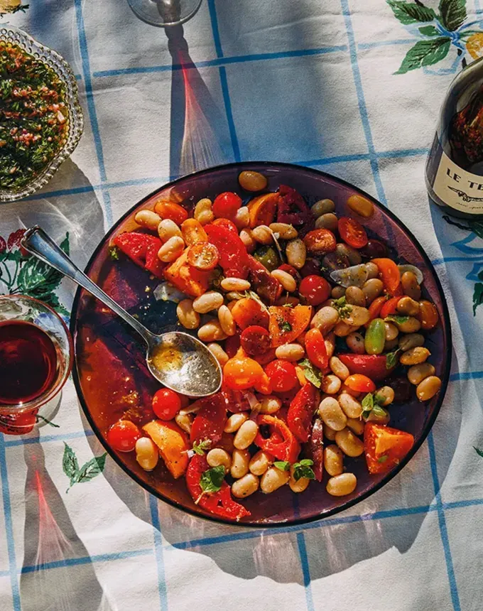 savory appetizers: marinated white bean and tomato salad' title='51 Savory Appetizers That Are Sure to Get the Party Started from Make-Ahead Gems to Cheesy Delights
