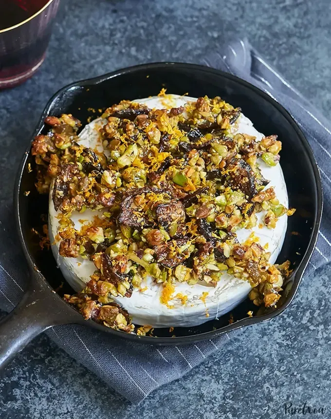 savory appetizers: baked brie with figs pistachios and orange' title='51 Savory Appetizers That Are Sure to Get the Party Started from Make-Ahead Gems to Cheesy Delights