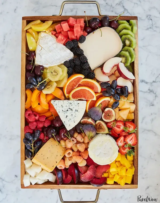 savory appetizers: fruit charcuterie board' title='51 Savory Appetizers That Are Sure to Get the Party Started from Make-Ahead Gems to Cheesy Delights