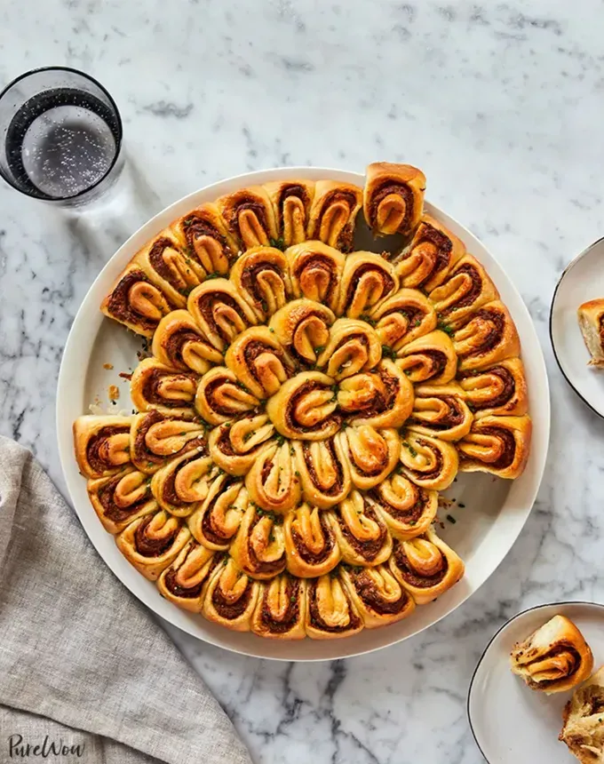 savory appetizers: pull-apart bread with caramelized onions and goat cheese' title='51 Savory Appetizers That Are Sure to Get the Party Started from Make-Ahead Gems to Cheesy Delights