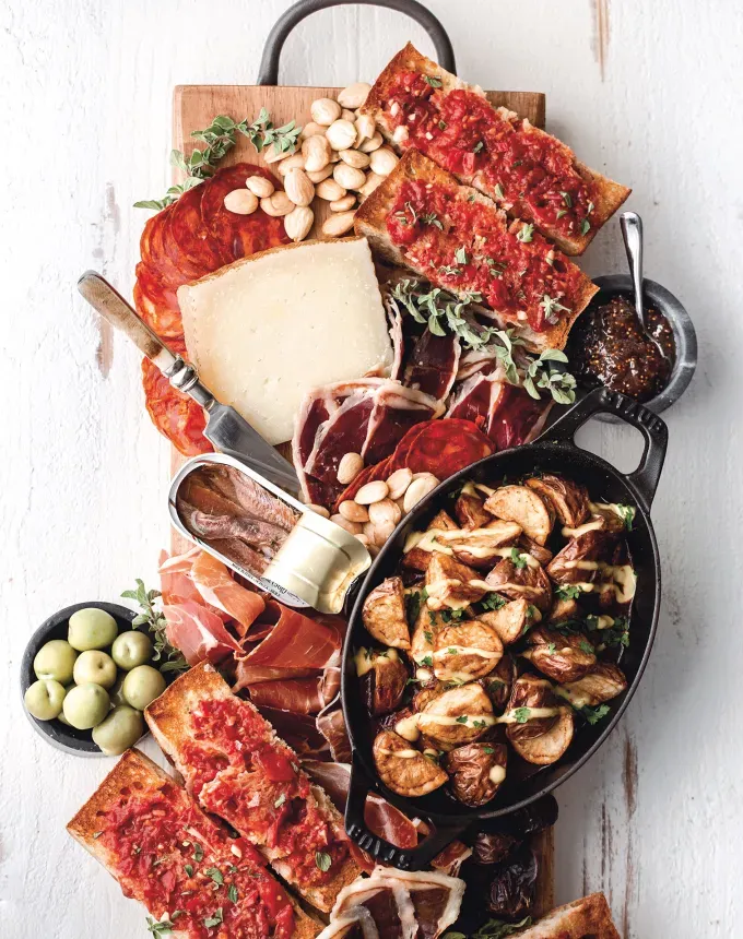 savory appetizers: spanish tapas board' title='51 Savory Appetizers That Are Sure to Get the Party Started from Make-Ahead Gems to Cheesy Delights