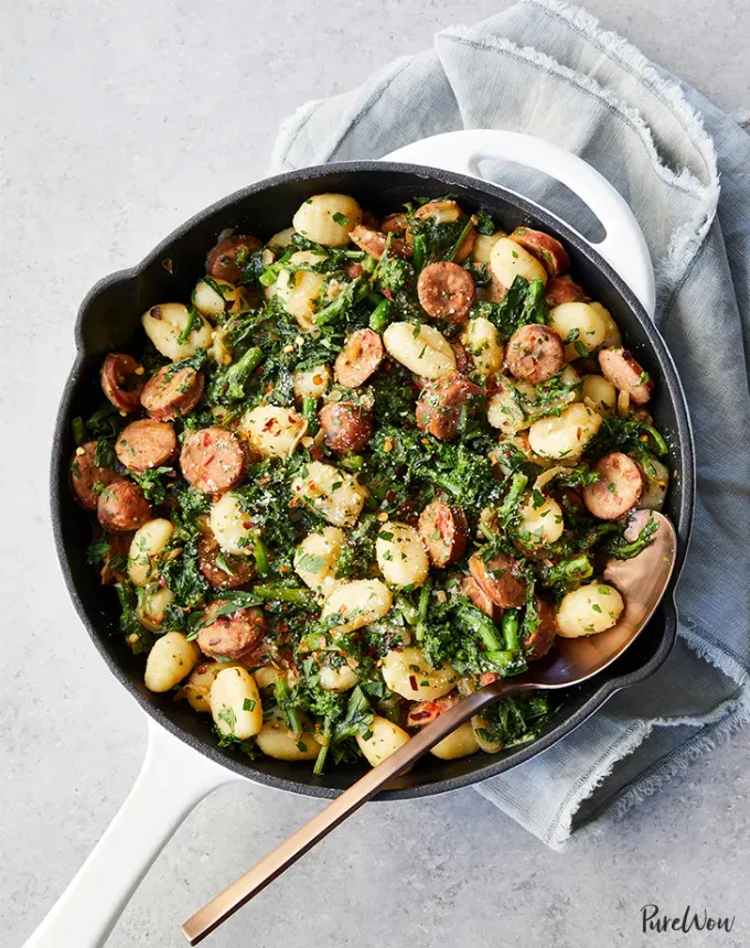 valentine’s day dinner ideas: skillet gnocchi with sausage and broccoli rabe' title='60 Valentine’s Day Dinner Ideas That Feel Fancy (but Not Cheesy)