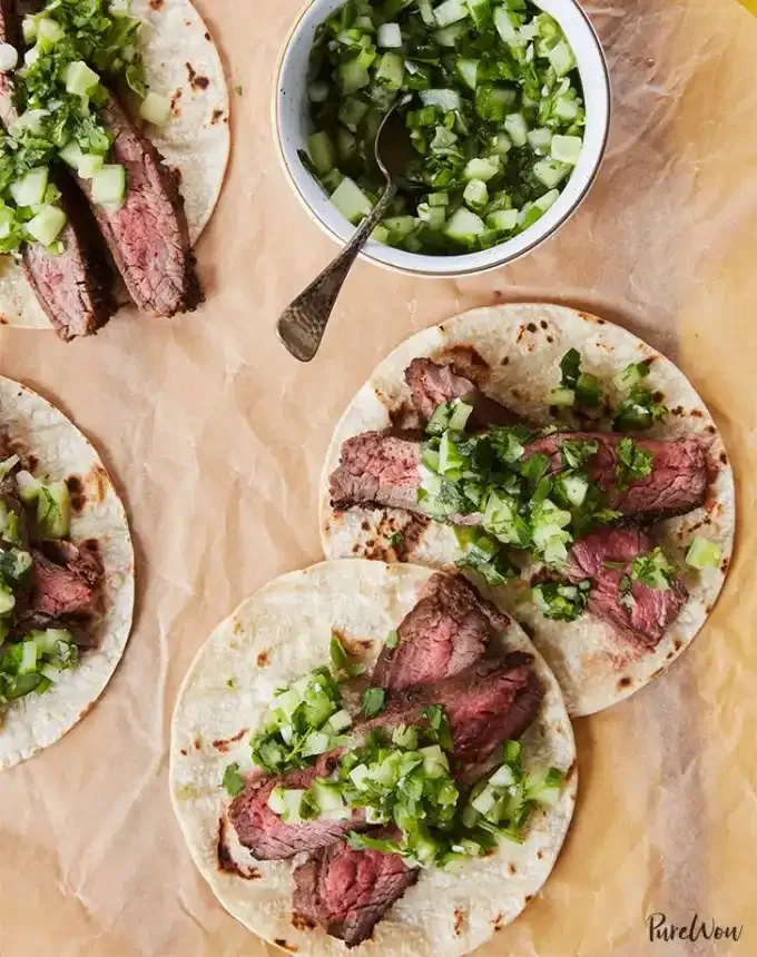 valentine’s day dinner ideas: flank steak tacos with cucumber salsa' title='60 Valentine’s Day Dinner Ideas That Feel Fancy (but Not Cheesy)
