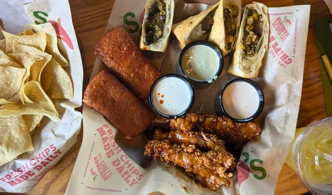 chili’s triple dipper hot mozz included with southwest egg rolls and crispers' fetchpriority='auto' title='Psst: The Best App at Chili’s Isn’t *Actually* on the Menu