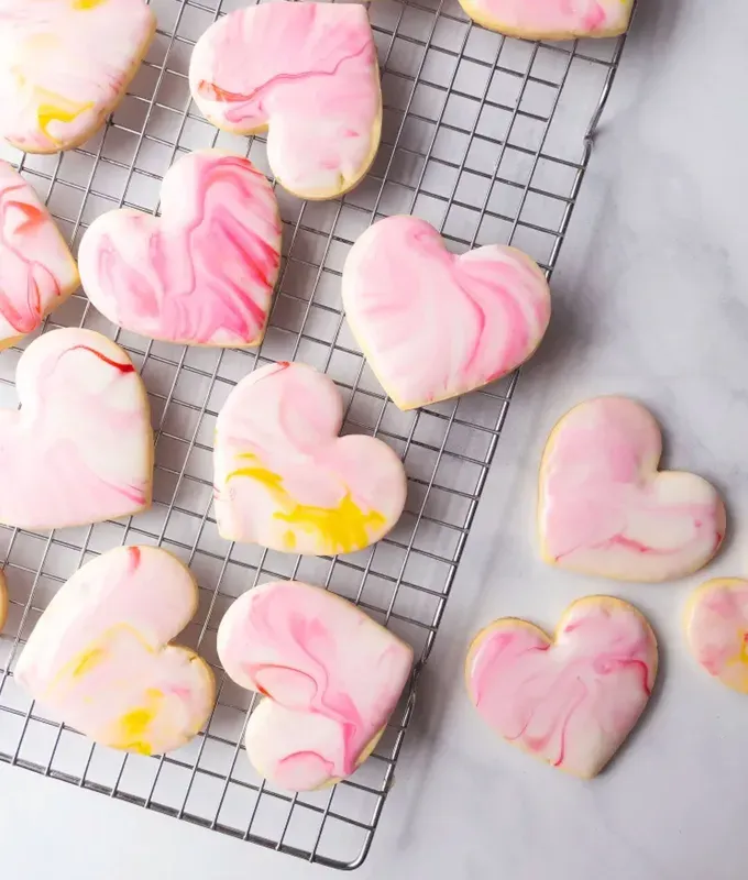 easy fun things to bake: heart-shaped tie-dye sugar cookies' title='78 Easy Fun Things to Bake When You’re Bored and Craving Something Sweet