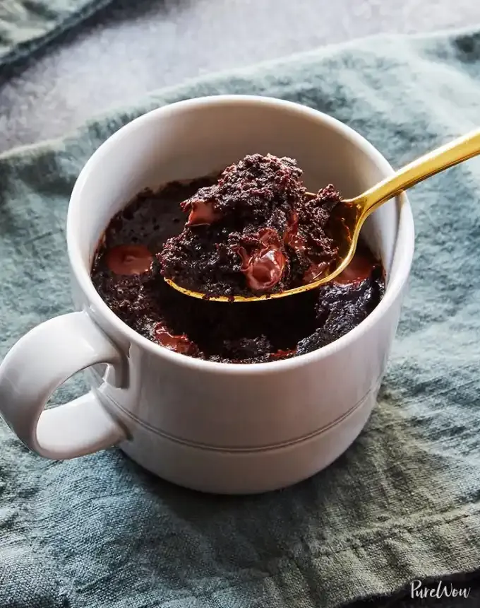 fun things to bake: mug chocolate chip brownie with a spoon' title='78 Easy Fun Things to Bake When You’re Bored and Craving Something Sweet