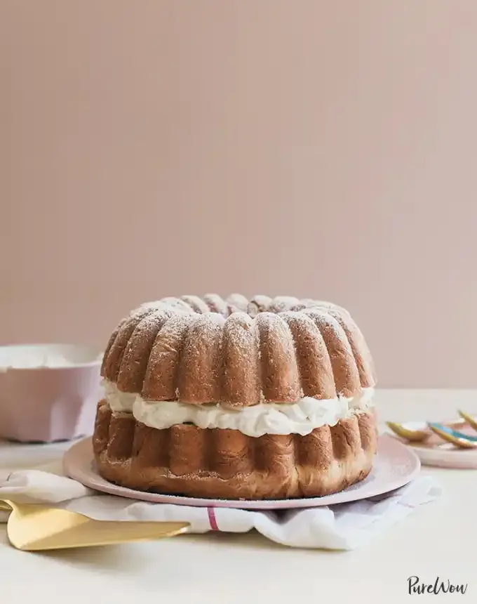 fun things to bake: cardamom cream-filled bundt cake on a plate' title='78 Easy Fun Things to Bake When You’re Bored and Craving Something Sweet