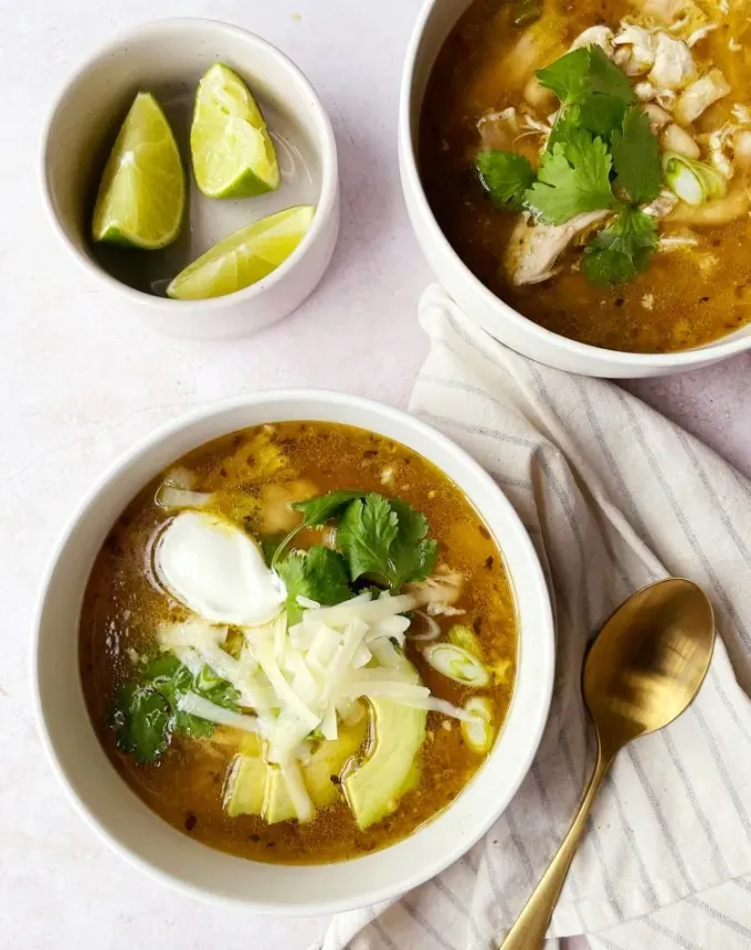 high protein soups: slow cooker spicy green chicken chili' title='21 High-Protein Soup Recipes That Are Satisfyingly Cozy