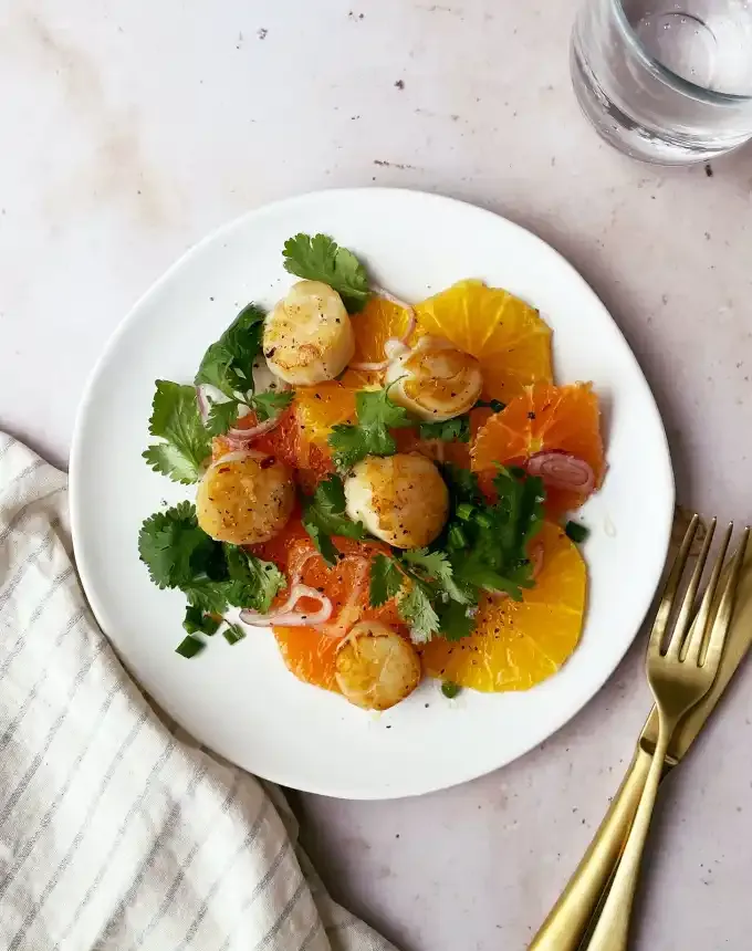 birthday dinner ideas: Seared Scallops with Citrus-Shallot Salad' title='60 Home-Cooked Birthday Dinner Ideas That Will Make Anyone’s Day