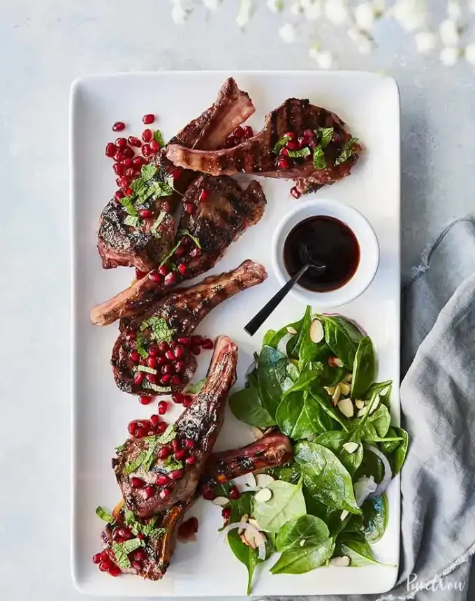 birthday dinner ideas: pomegranate maple glazed lamb chops' title='60 Home-Cooked Birthday Dinner Ideas That Will Make Anyone’s Day