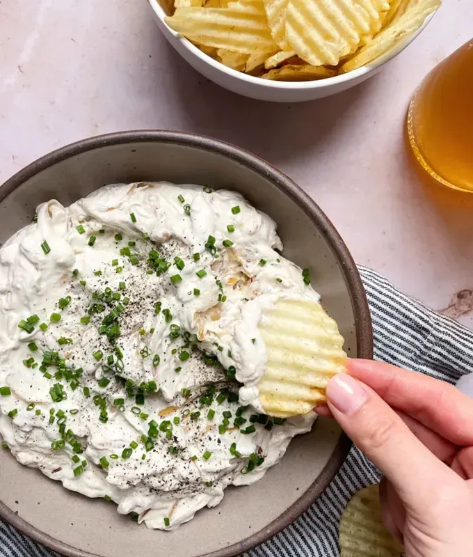 best appetizers to bring to a party: french onion dip' title='The 25 Best Appetizers to Bring to a Party from Crowd-Pleasing Dips to Make-Ahead Snacks