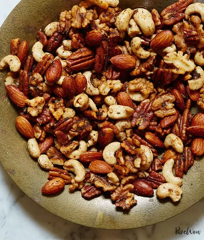best appetizers to bring to a party: roasted mixed nuts' title='The 25 Best Appetizers to Bring to a Party from Crowd-Pleasing Dips to Make-Ahead Snacks