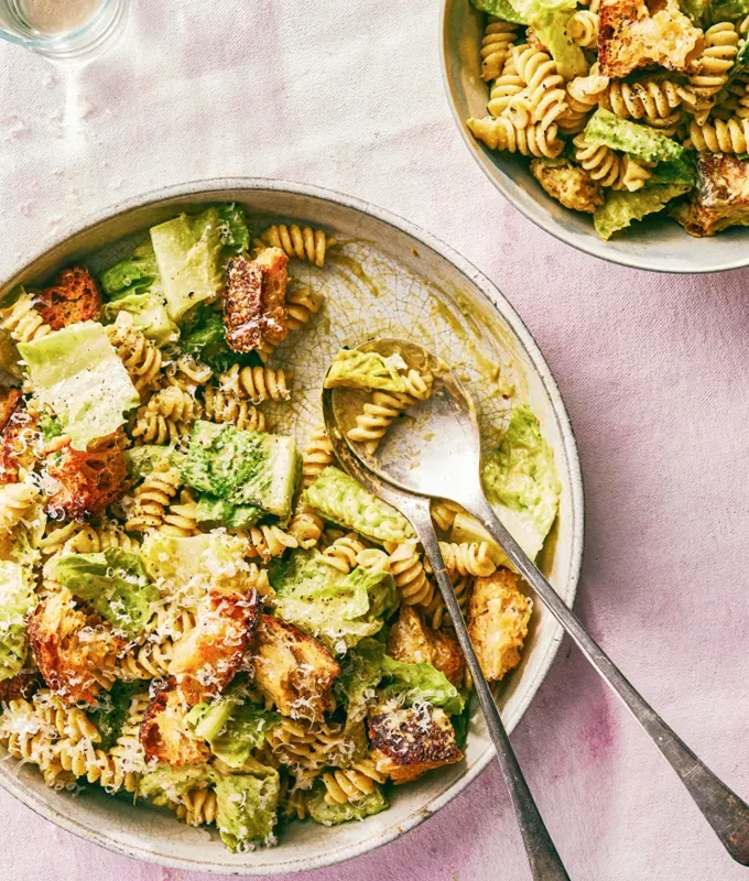 best appetizers to bring to a party: caesar pasta salad' title='The 25 Best Appetizers to Bring to a Party from Crowd-Pleasing Dips to Make-Ahead Snacks