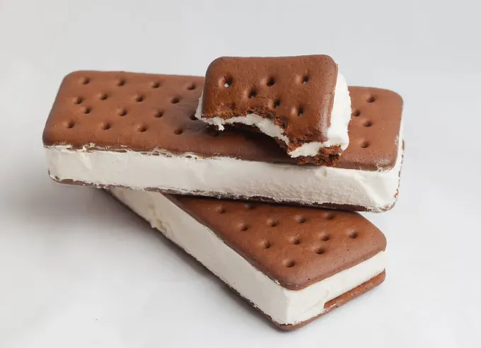 best nostalgic ice cream truck treats: two ice cream sandwiches stacked' fetchpriority='auto' title='The Best Nostalgic Ice Cream Truck Treats of All Time Ranked