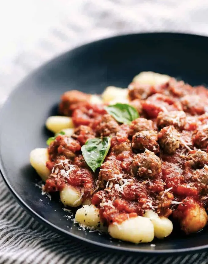 easy gnocchi recipes: sausage and tomato gnocchi' title='35 Easy Gnocchi Recipes You Can Make at Home