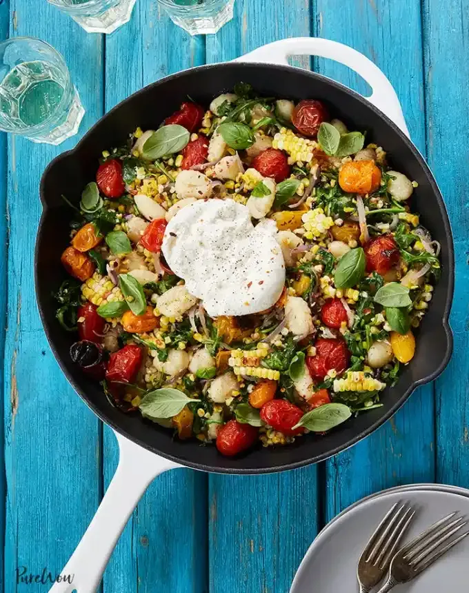 easy gnocchi recipes: summer skillet gnocchi with grilled corn and burrata' title='35 Easy Gnocchi Recipes You Can Make at Home