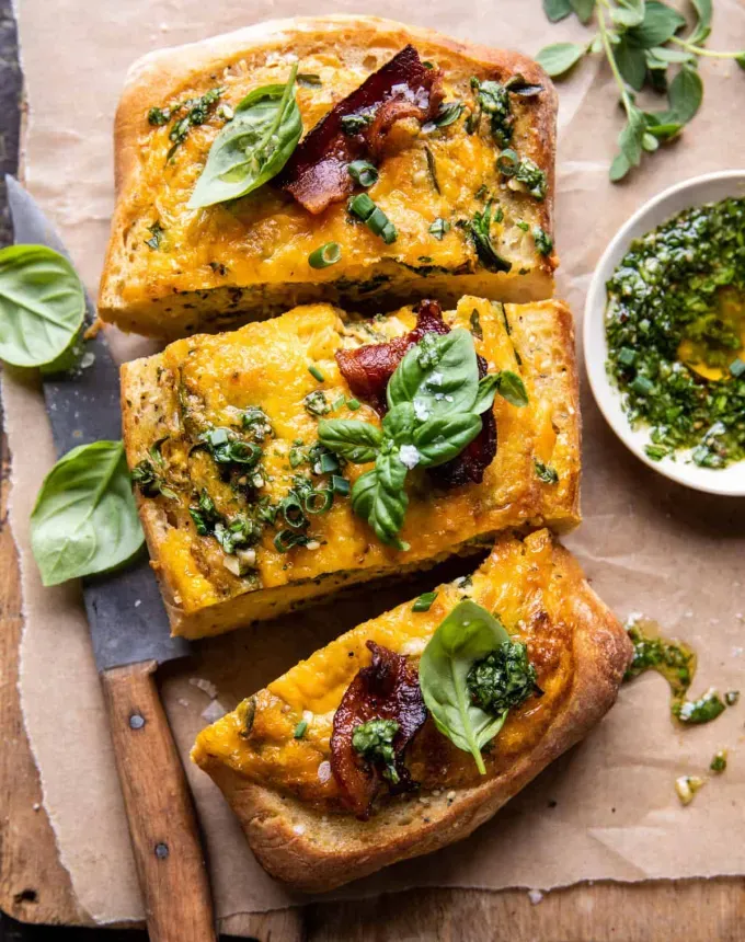 easter brunch ideas: cheddar pesto egg boats' title='66 Easter Brunch Ideas That Are Quick Easy and Festive
