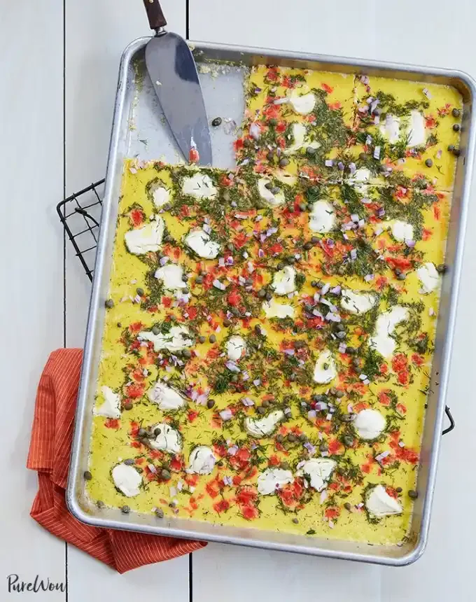 easter brunch ideas: sheet pan eggs with smoked salmon and cream cheese' title='66 Easter Brunch Ideas That Are Quick Easy and Festive