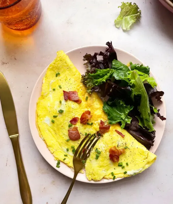 easter brunch ideas: jalapeño popper omelet recipe' title='66 Easter Brunch Ideas That Are Quick Easy and Festive