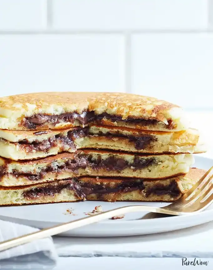 easter brunch ideas: nutella stuffed pancakes' title='66 Easter Brunch Ideas That Are Quick Easy and Festive