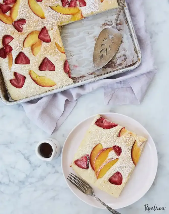 easter brunch ideas: baked pancakes with peaches and strawberries' title='66 Easter Brunch Ideas That Are Quick Easy and Festive