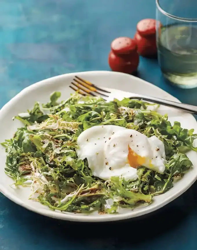 easter brunch ideas: poached egg with frisee and arugula' title='66 Easter Brunch Ideas That Are Quick Easy and Festive