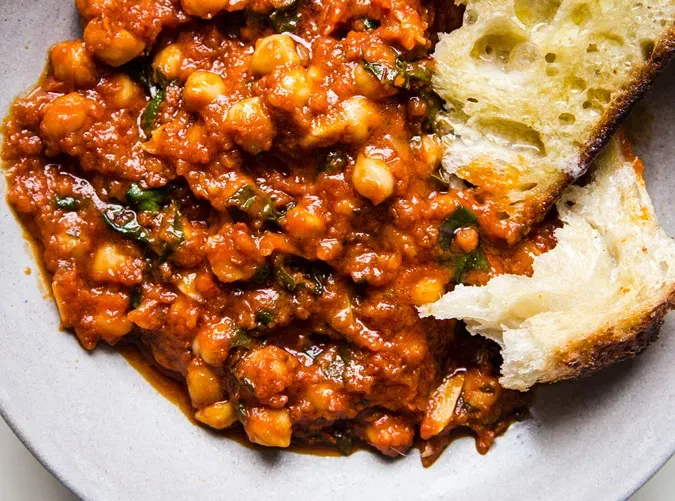 recipes with tomato sauce braised chickpeas with chard recipe' title='49 Dinners You Can Make with a Jar of Tomato Sauce