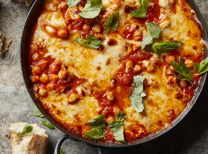 recipes with tomato sauce skillet cheesy chickpeas recipe' title='49 Dinners You Can Make with a Jar of Tomato Sauce