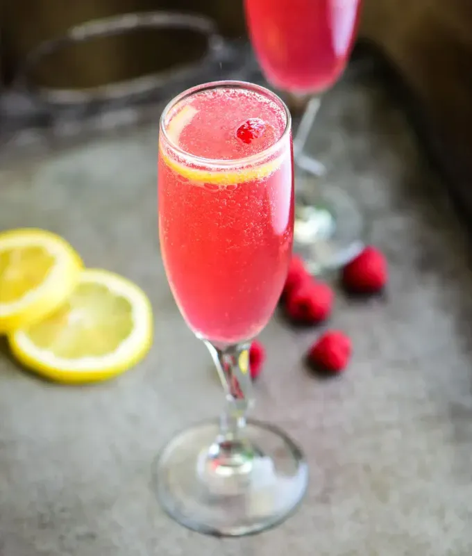 low-sugar cocktails: raspberry french 75' title='20 Delicious Low-Sugar Cocktails That Aren’t Syrupy-Sweet