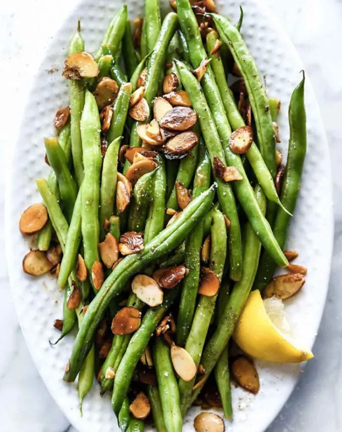 side dishes for ham: brown butter green beans almondine' title='62 Side Dishes for Ham to Serve on Easter Christmas and Every Day in Between